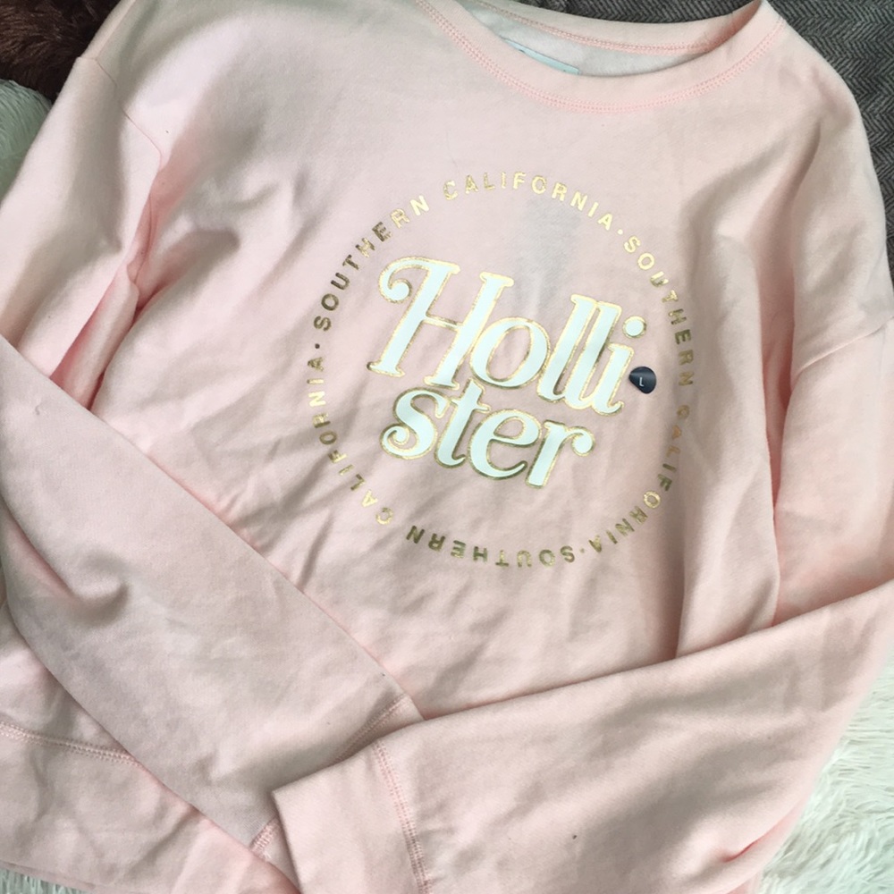 Long sleeved light pink hollister shirt
